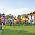 Apartment In Villaggio Ai Pini In Lido Altanea