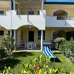 Jody Bibione, Poolside Apartment With Garden