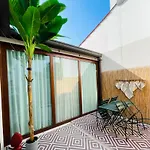 Locatelli Apartments - Patio Living 